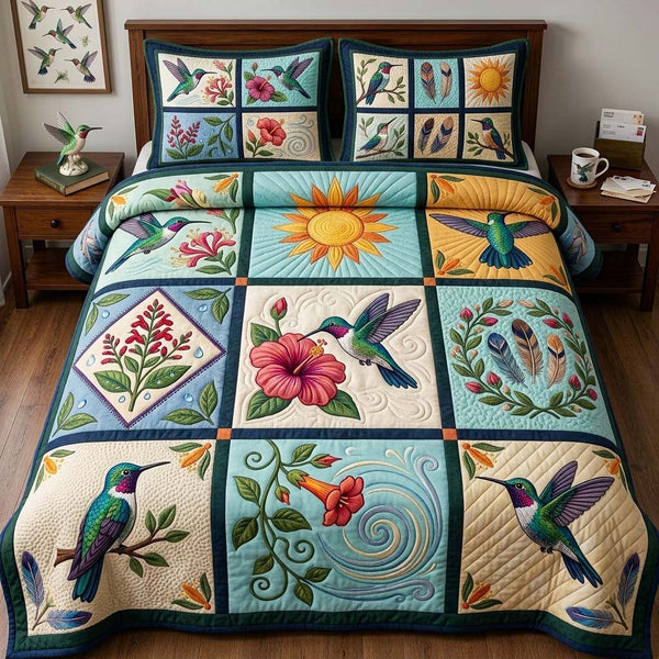 Nine Gardens Of Fligh quilted 3-piece bedding set on a made bed with two matching pillow shams