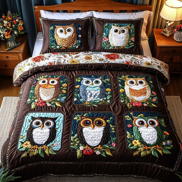 Nocturnal Grace quilted 3-piece bedding set on a made bed with two matching pillow shams