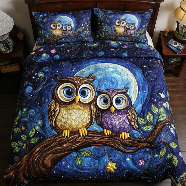 Nocturnal Pair quilted 3-piece bedding set on a made bed with two matching pillow shams