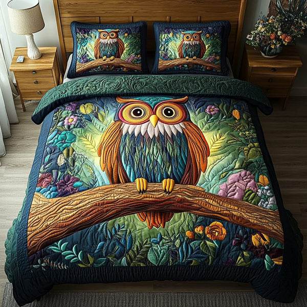 Nocturnal Spirit quilted 3-piece bedding set on a made bed with two matching pillow shams