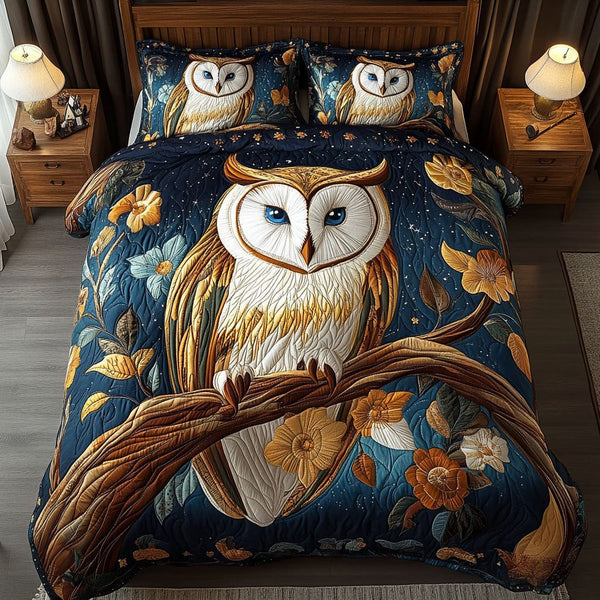 Nocturnal Wings quilted 3-piece bedding set on a made bed with two matching pillow shams