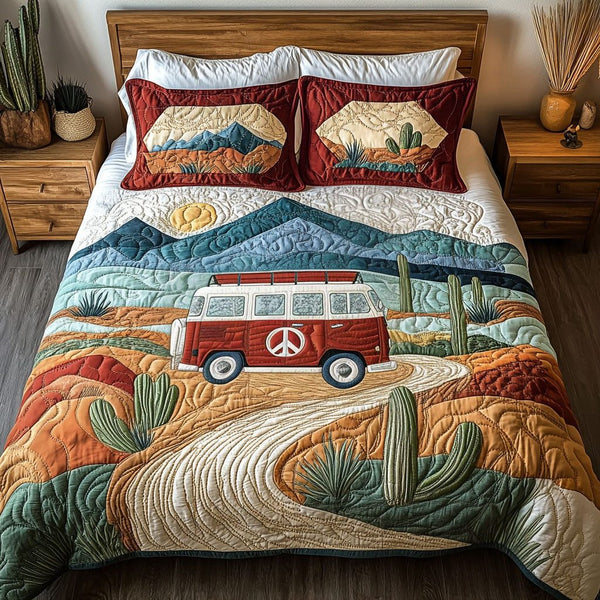Nomadic Spirit quilted 3-piece bedding set on a made bed with two matching pillow shams