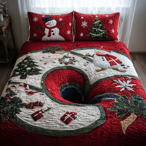North Pole Portal quilted 3-piece bedding set on a made bed with two matching pillow shams