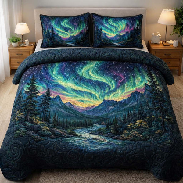 Northern Valley Glow quilted 3-piece bedding set on a made bed with two matching pillow shams