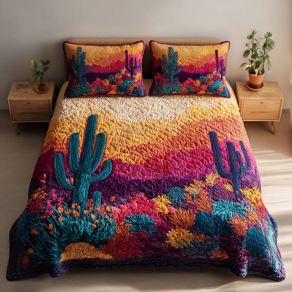 Oasis Glow quilted 3-piece bedding set on a made bed with two matching pillow shams