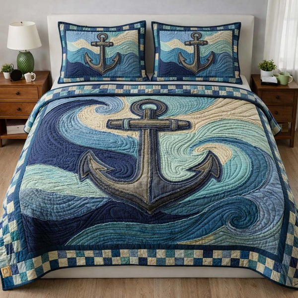 Ocean Anchor quilted 3-piece bedding set on a made bed in a light coastal bedroom