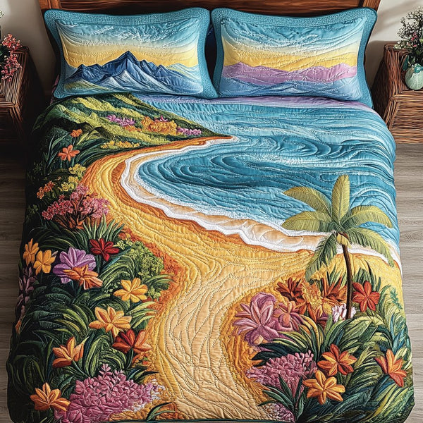 Ocean Bloom quilted 3-piece bedding set on a made bed in a light coastal bedroom