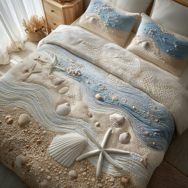 Ocean Breeze quilted 3-piece bedding set on a made bed in a light coastal bedroom