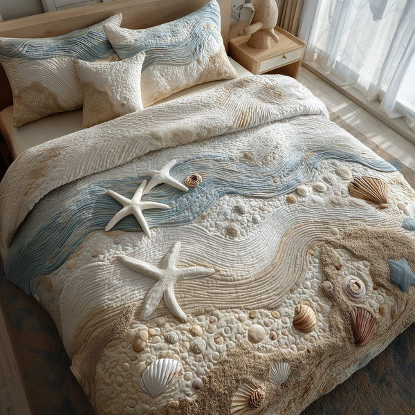 Ocean Breeze quilted 3-piece bedding set on a made bed in a light coastal bedroom