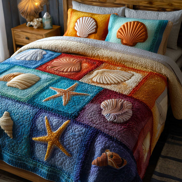 Ocean Breeze quilted 3-piece bedding set on a made bed in a light coastal bedroom