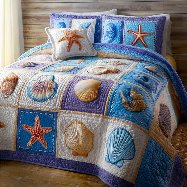Ocean Breeze quilted 3-piece bedding set on a made bed in a light coastal bedroom