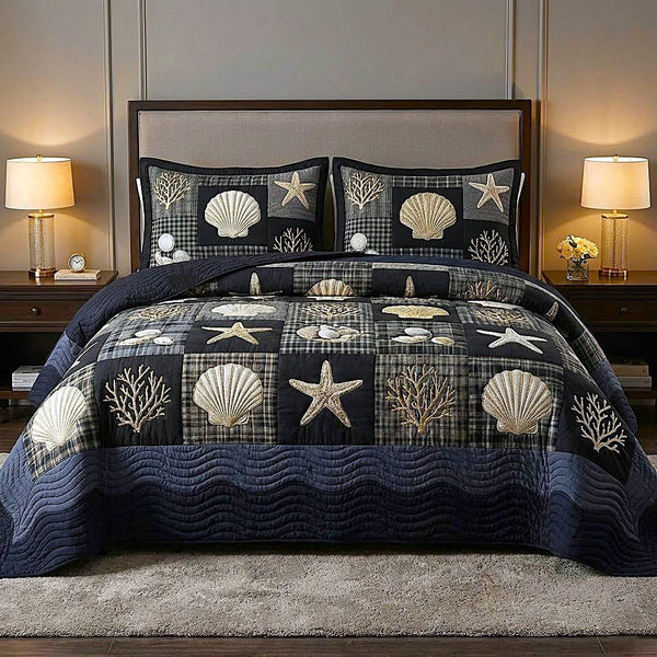 Ocean Breeze quilted 3-piece bedding set on a made bed in a light coastal bedroom