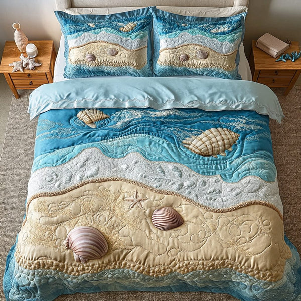 Ocean Breeze quilted 3-piece bedding set on a made bed in a light coastal bedroom