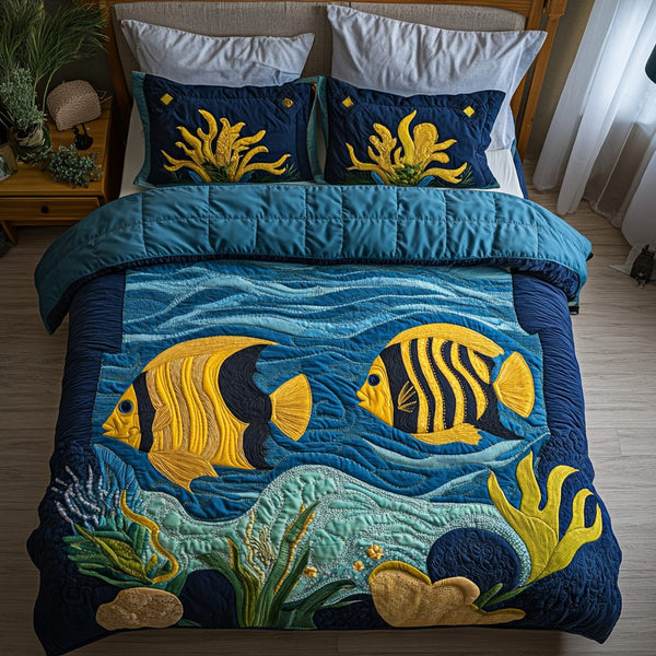 Ocean Breeze quilted 3-piece bedding set on a made bed in a light coastal bedroom