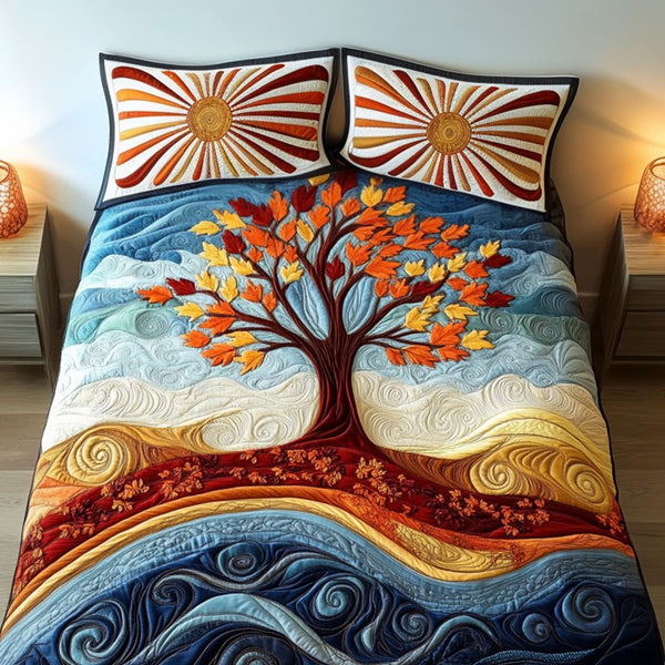 Ocean Breeze Tree quilted 3-piece bedding set on a made bed in a light coastal bedroom
