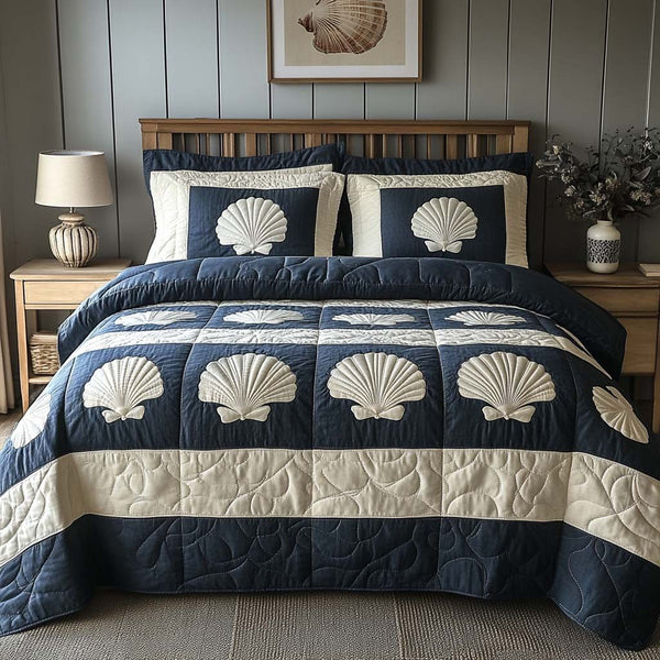 Ocean Calm quilted 3-piece bedding set on a made bed in a light coastal bedroom