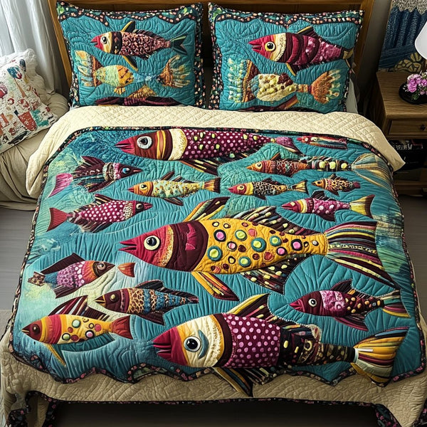 Ocean Dreams quilted 3-piece bedding set on a made bed in a light coastal bedroom