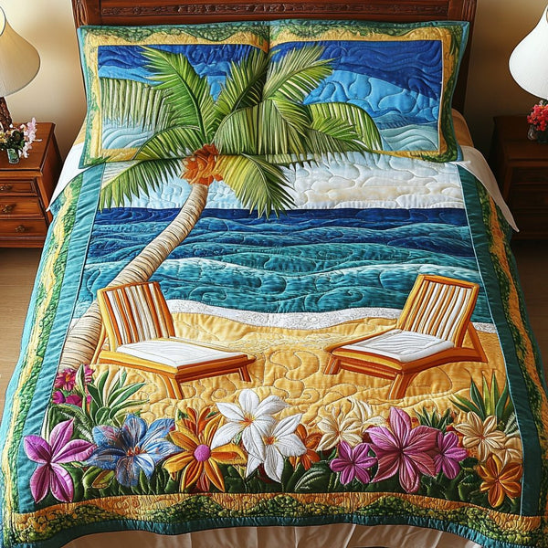 Ocean Dreams quilted 3-piece bedding set on a made bed in a light coastal bedroom