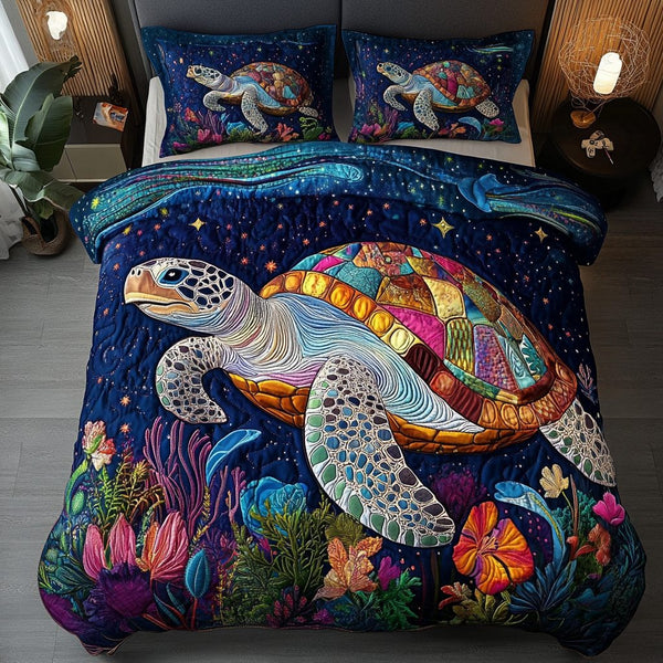 Ocean Drifter quilted 3-piece bedding set on a made bed in a light coastal bedroom