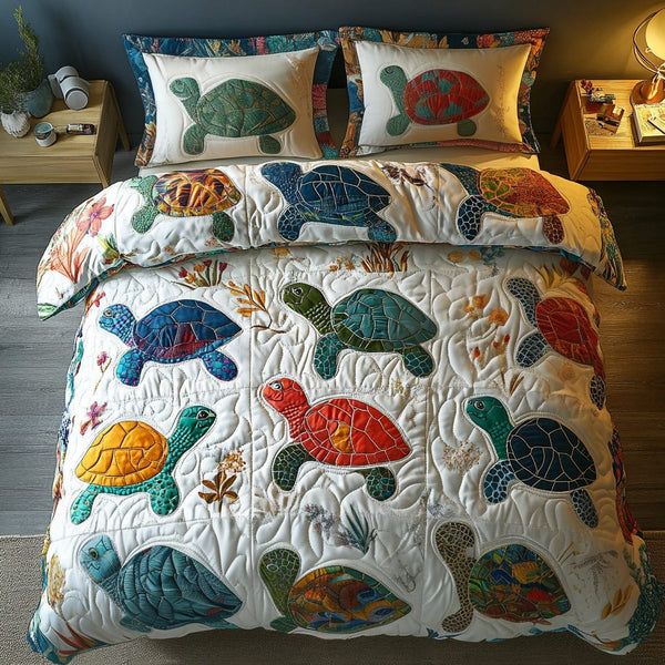Ocean Drifters quilted 3-piece bedding set on a made bed in a light coastal bedroom