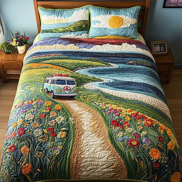 Ocean Explorer quilted 3-piece bedding set on a made bed in a light coastal bedroom