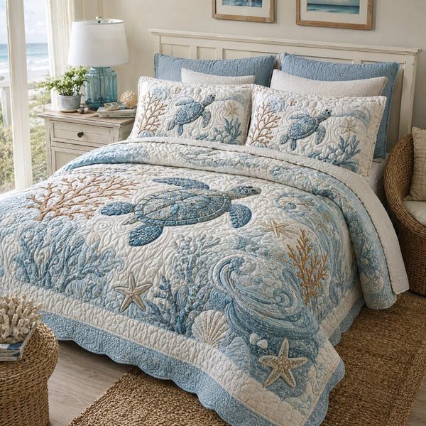 Ocean Friends quilted 3-piece bedding set on a made bed in a light coastal bedroom