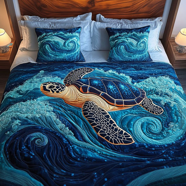 Ocean Glide quilted 3-piece bedding set on a made bed in a light coastal bedroom