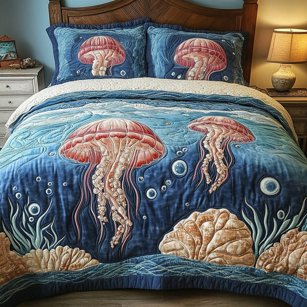 Ocean Glow quilted 3-piece bedding set on a made bed in a light coastal bedroom