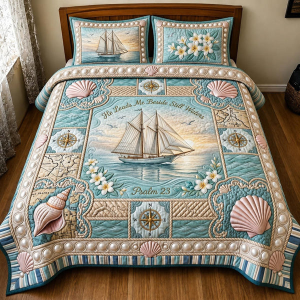 Ocean Grace quilted 3-piece bedding set on a made bed in a light coastal bedroom