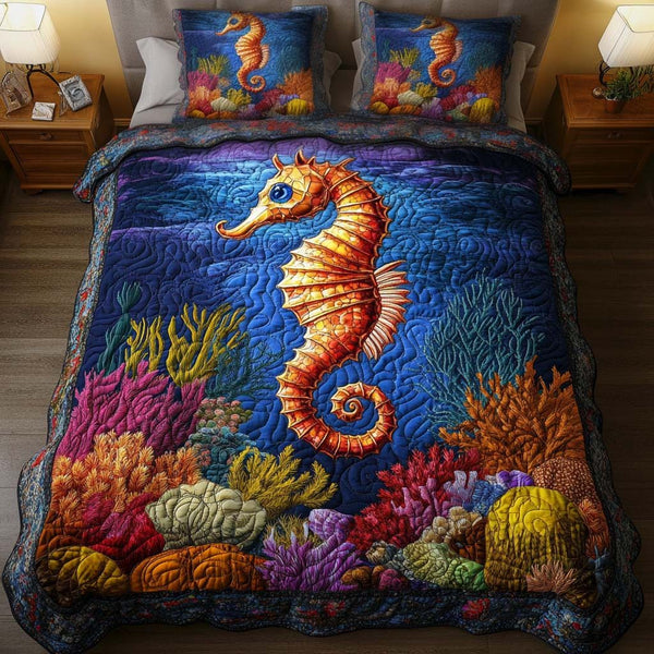 Ocean Majesty quilted 3-piece bedding set on a made bed in a light coastal bedroom