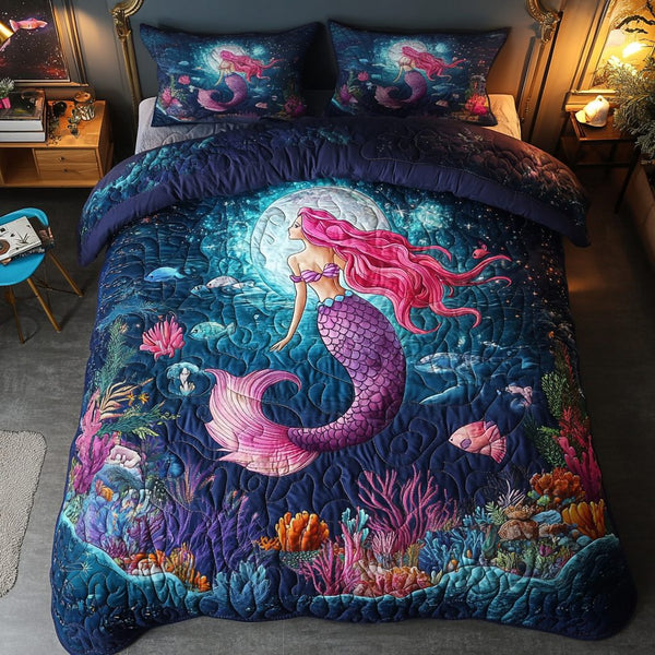 Ocean Mermaid quilted 3-piece bedding set on a made bed in a light coastal bedroom
