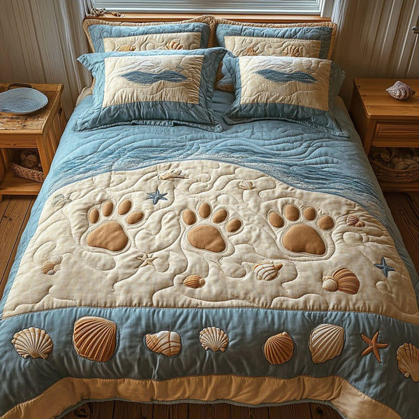 Ocean Paws quilted 3-piece bedding set on a made bed in a light coastal bedroom