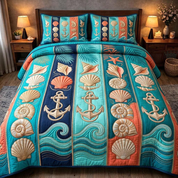 Ocean Pearls quilted 3-piece bedding set on a made bed in a light coastal bedroom