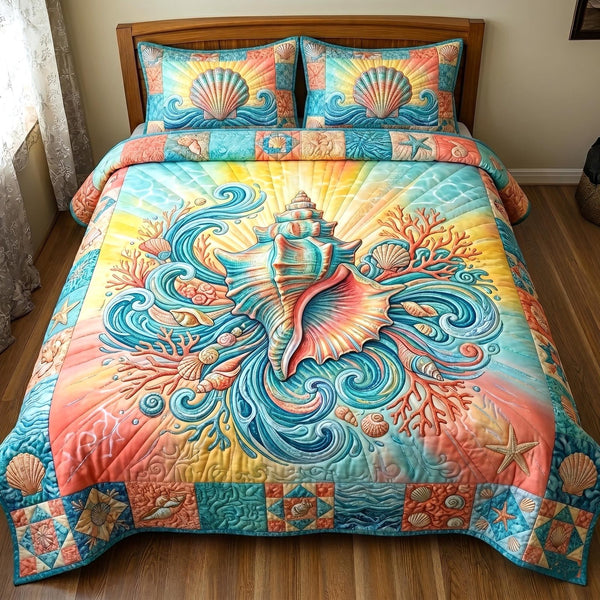 Ocean Pearls quilted 3-piece bedding set on a made bed in a light coastal bedroom