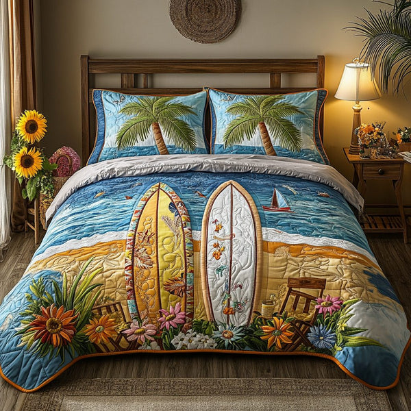 Ocean quilted 3-piece bedding set on a made bed in a light coastal bedroom