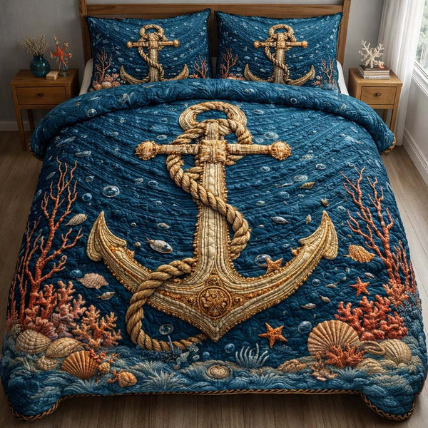 Ocean Reef Anchor quilted 3-piece bedding set on a made bed in a light coastal bedroom