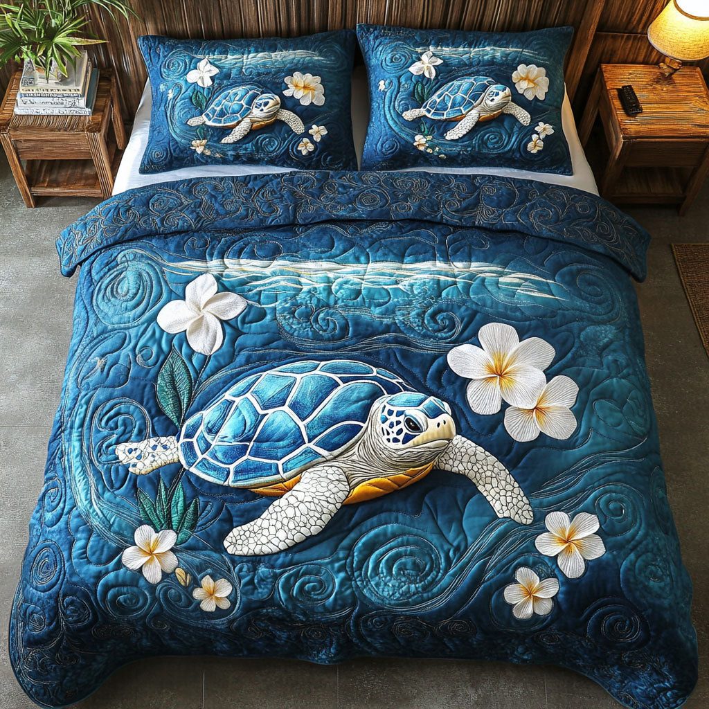 Ocean Shell Echo quilted 3-piece bedding set on a made bed in a light coastal bedroom