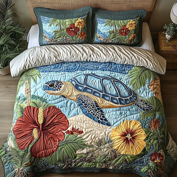 Ocean Spirit quilted 3-piece bedding set on a made bed in a light coastal bedroom