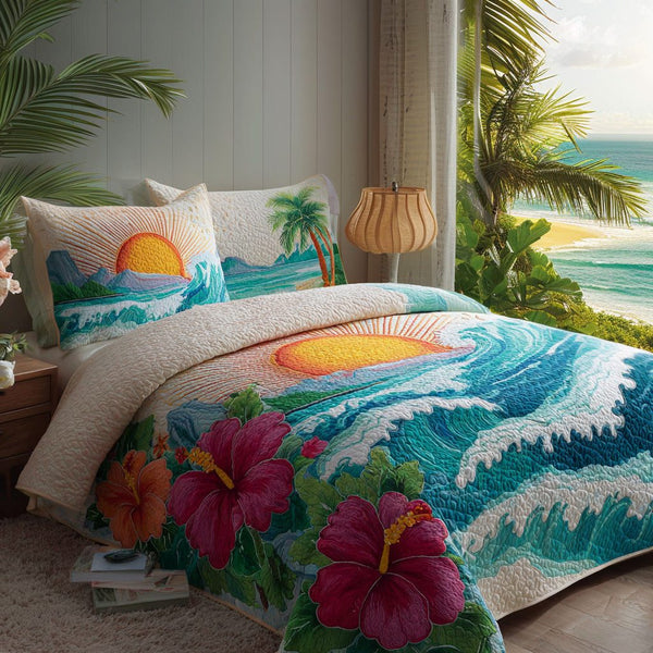 Ocean Sunset quilted 3-piece bedding set on a made bed in a light coastal bedroom