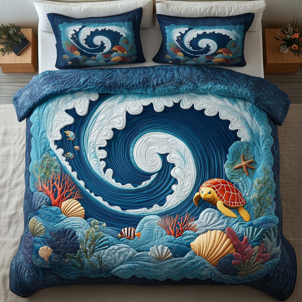 Ocean Swirl quilted 3-piece bedding set on a made bed in a light coastal bedroom