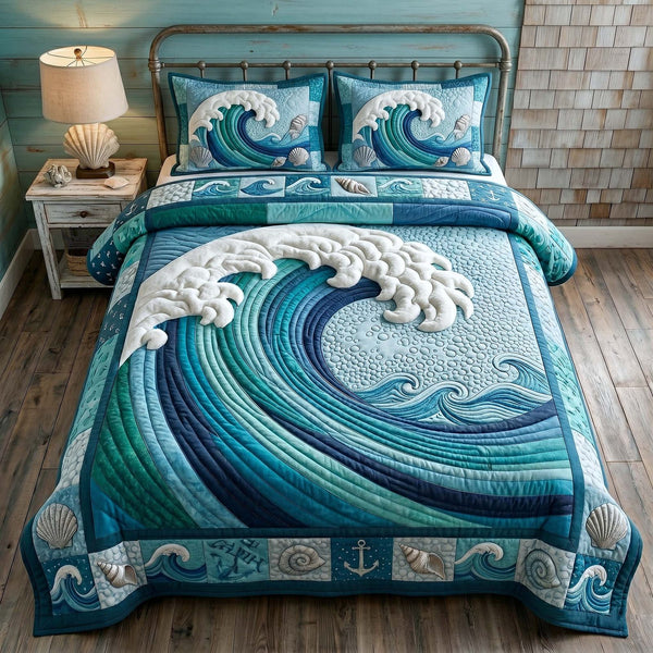 Ocean Tide quilted 3-piece bedding set on a made bed in a light coastal bedroom