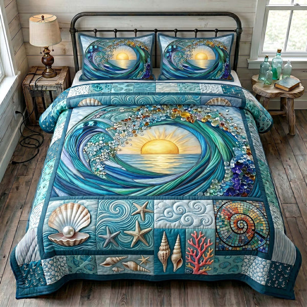 Ocean Tide quilted 3-piece bedding set on a made bed in a light coastal bedroom