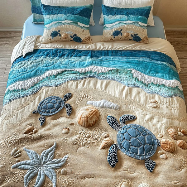 Ocean Traveler quilted 3-piece bedding set on a made bed in a light coastal bedroom