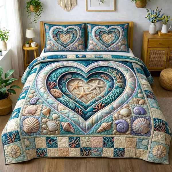 Ocean Treasure quilted 3-piece bedding set on a made bed in a light coastal bedroom