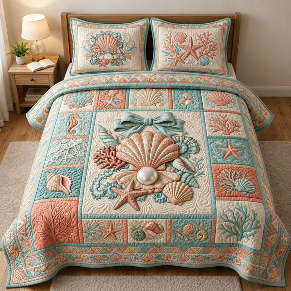 Ocean Treasures quilted 3-piece bedding set on a made bed in a light coastal bedroom