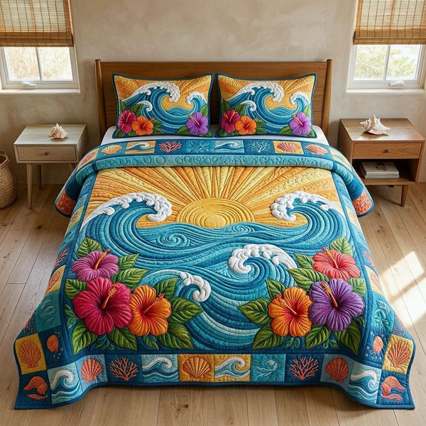 Ocean Tropic quilted 3-piece bedding set on a made bed in a light coastal bedroom