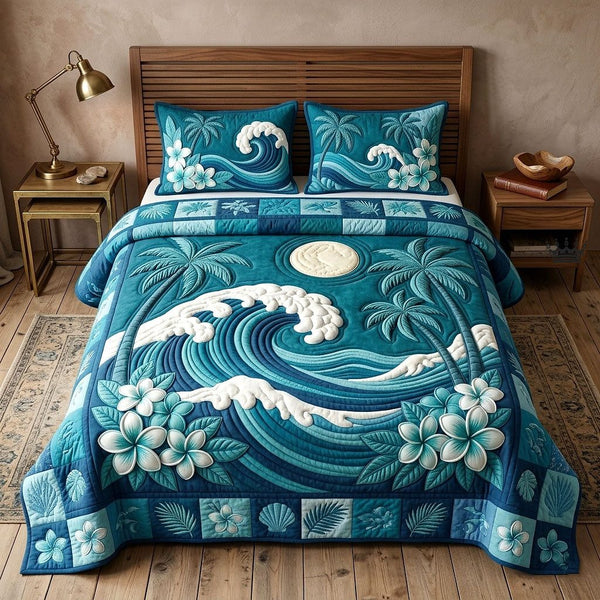 Ocean Tropic quilted 3-piece bedding set on a made bed in a light coastal bedroom