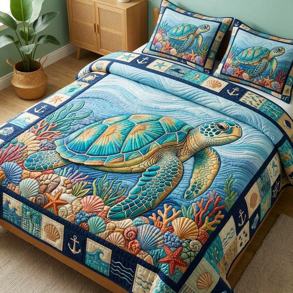 Ocean Turtle quilted 3-piece bedding set on a made bed in a light coastal bedroom