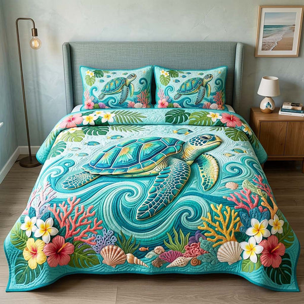 Ocean Turtle quilted 3-piece bedding set on a made bed in a light coastal bedroom