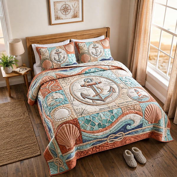 Ocean Voyage quilted 3-piece bedding set on a made bed in a light coastal bedroom
